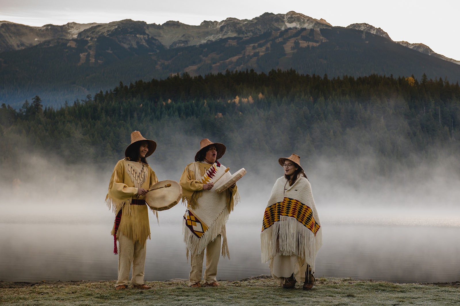 Cultural Ambassadors in regalia and salish wool weavings