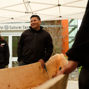 Master Carver Ray Natraoro with the Community Reconciliation Canoe