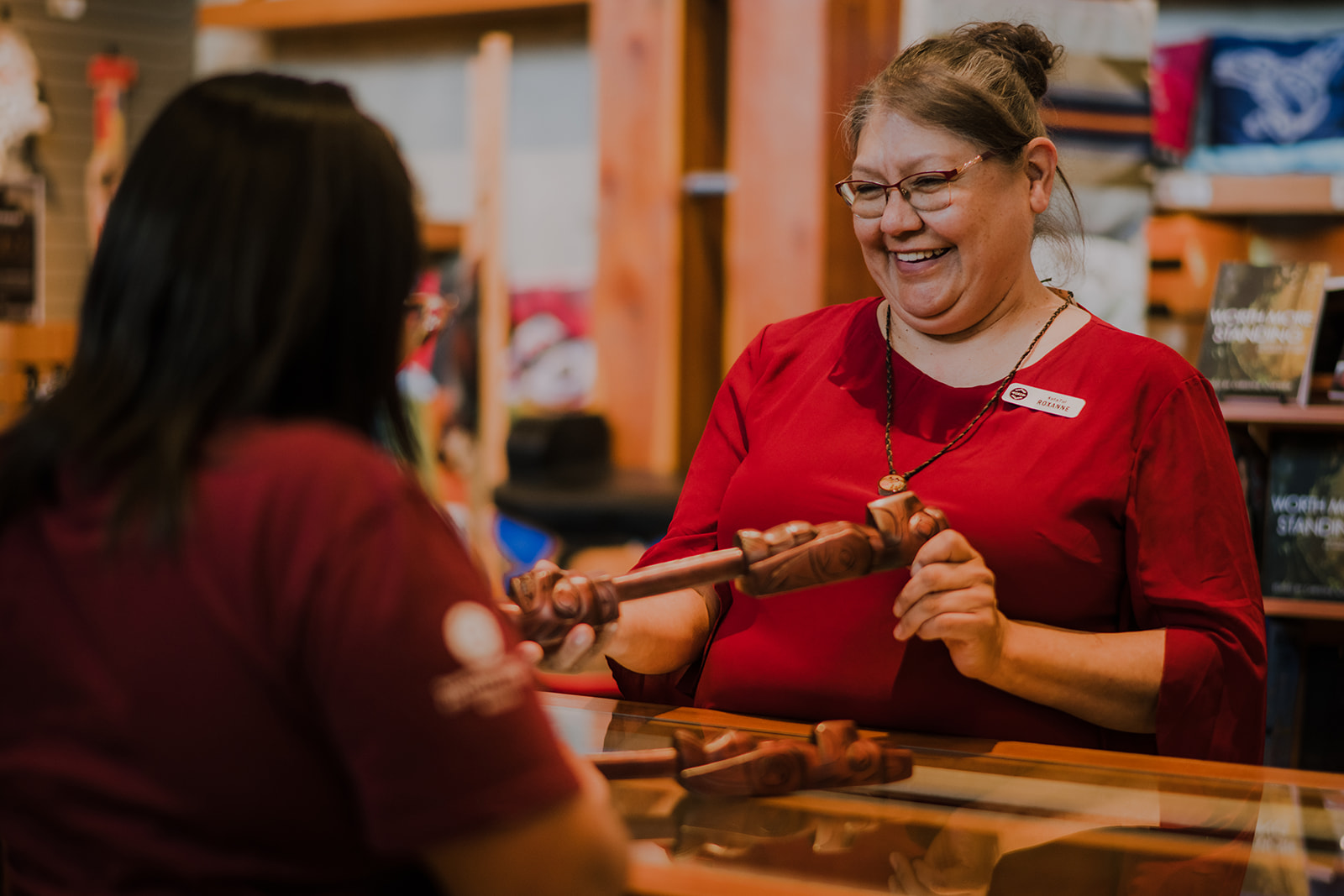 Knowledgable Ambassadors share Artist details at the SLCC Gallery and Gift Shop